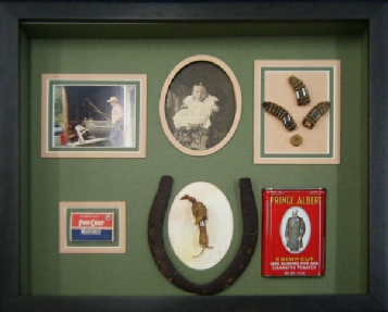 antique family pictures, souvenirs a good-luck horseshoe artfully mounted with matting and framed