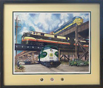 framed picture of two trains, one is on a bridge on top of the other